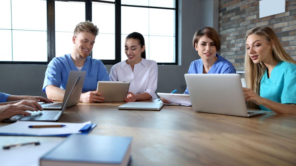 A private practice director briefing a provisional psychologist on their 5+1 internship placement